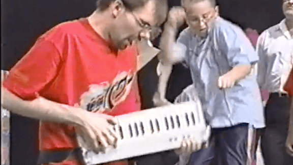 Person playing a musical instrument