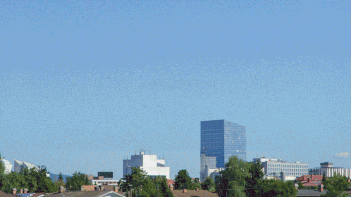 Drone delivering package.