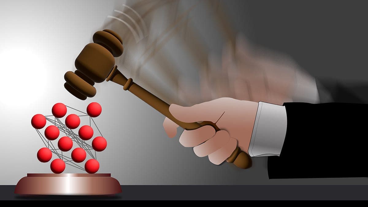 Gavel striking a neural network, symbolizing legal decisions impacting AI and machine learning technologies.